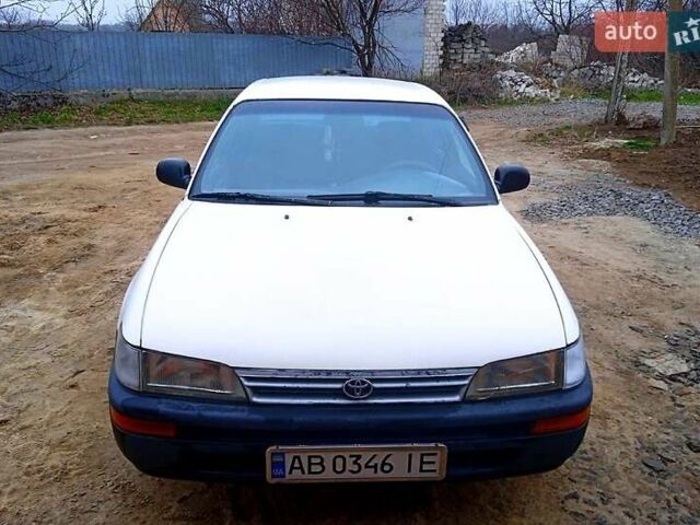 Белый Тойота Королла, объемом двигателя 1.3 л и пробегом 330 тыс. км за 2200 $, фото 1 на Automoto.ua