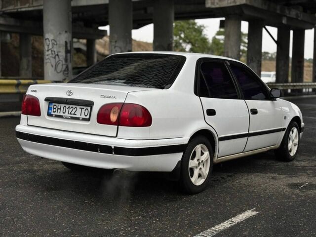 Белый Тойота Королла, объемом двигателя 1.3 л и пробегом 200 тыс. км за 2200 $, фото 4 на Automoto.ua