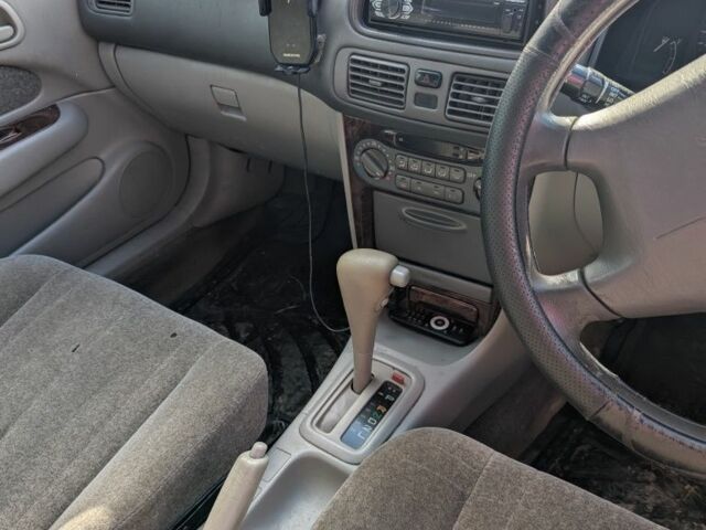 Белый Тойота Королла, объемом двигателя 1.5 л и пробегом 150 тыс. км за 2000 $, фото 3 на Automoto.ua