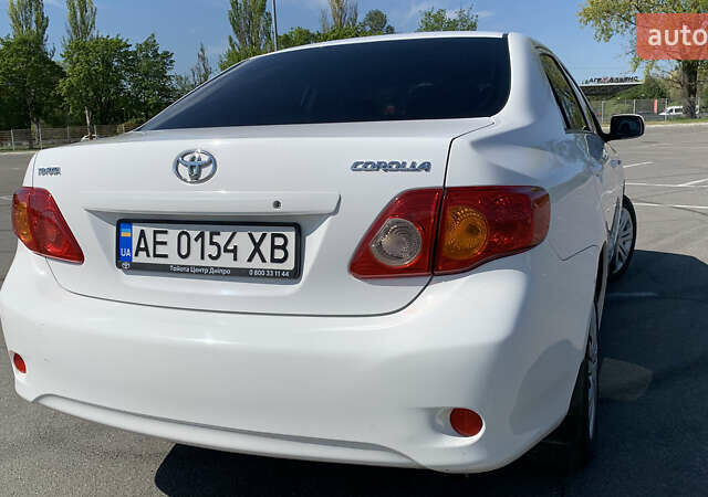 Белый Тойота Королла, объемом двигателя 1.6 л и пробегом 164 тыс. км за 6899 $, фото 6 на Automoto.ua