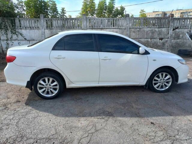 Білий Тойота Королла, об'ємом двигуна 1.6 л та пробігом 300 тис. км за 5600 $, фото 1 на Automoto.ua