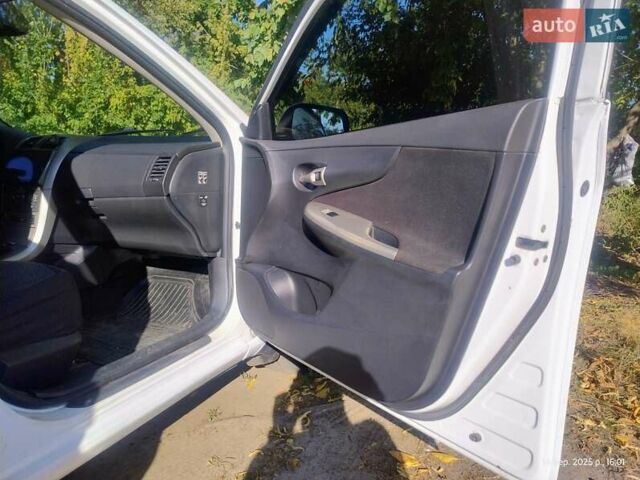 Белый Тойота Королла, объемом двигателя 1.6 л и пробегом 143 тыс. км за 8450 $, фото 11 на Automoto.ua