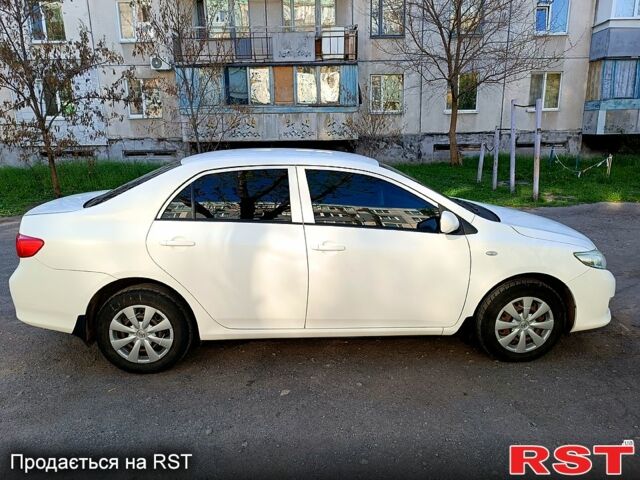 Белый Тойота Королла, объемом двигателя 1.3 л и пробегом 167 тыс. км за 6700 $, фото 1 на Automoto.ua