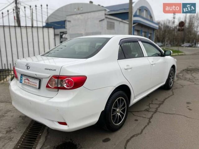 Белый Тойота Королла, объемом двигателя 1.33 л и пробегом 189 тыс. км за 7199 $, фото 3 на Automoto.ua