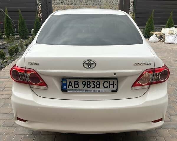 Белый Тойота Королла, объемом двигателя 1.33 л и пробегом 164 тыс. км за 7000 $, фото 2 на Automoto.ua