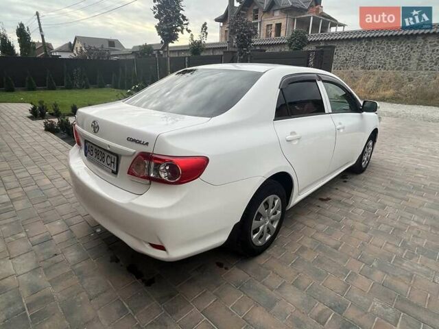 Белый Тойота Королла, объемом двигателя 1.33 л и пробегом 164 тыс. км за 7000 $, фото 3 на Automoto.ua