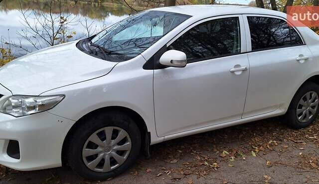 Белый Тойота Королла, объемом двигателя 1.3 л и пробегом 279 тыс. км за 6500 $, фото 6 на Automoto.ua