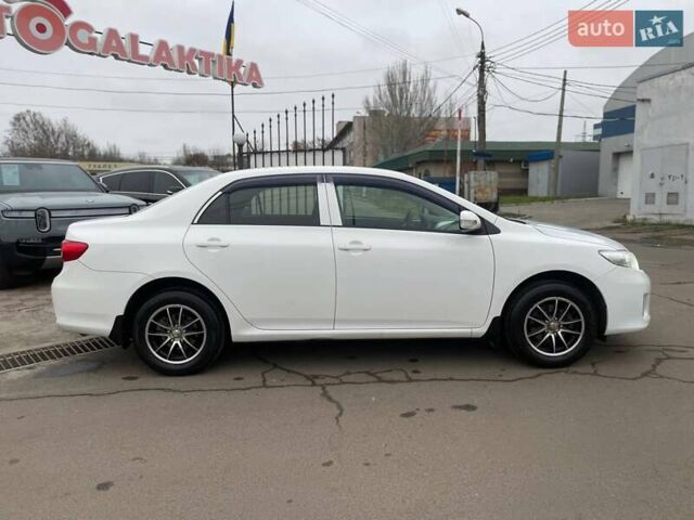 Белый Тойота Королла, объемом двигателя 1.33 л и пробегом 189 тыс. км за 7199 $, фото 6 на Automoto.ua