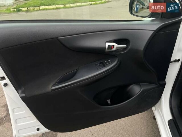 Белый Тойота Королла, объемом двигателя 1.33 л и пробегом 189 тыс. км за 7199 $, фото 14 на Automoto.ua