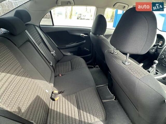 Белый Тойота Королла, объемом двигателя 1.33 л и пробегом 164 тыс. км за 7000 $, фото 8 на Automoto.ua