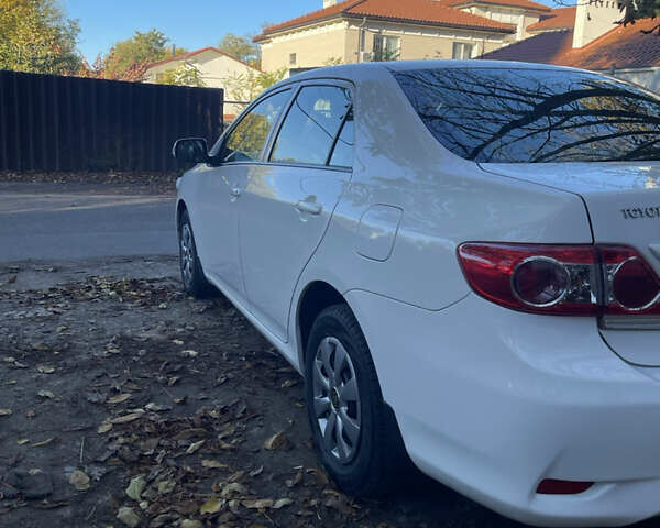 Белый Тойота Королла, объемом двигателя 1.33 л и пробегом 143 тыс. км за 7000 $, фото 4 на Automoto.ua