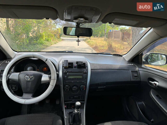 Белый Тойота Королла, объемом двигателя 1.33 л и пробегом 188 тыс. км за 6600 $, фото 19 на Automoto.ua