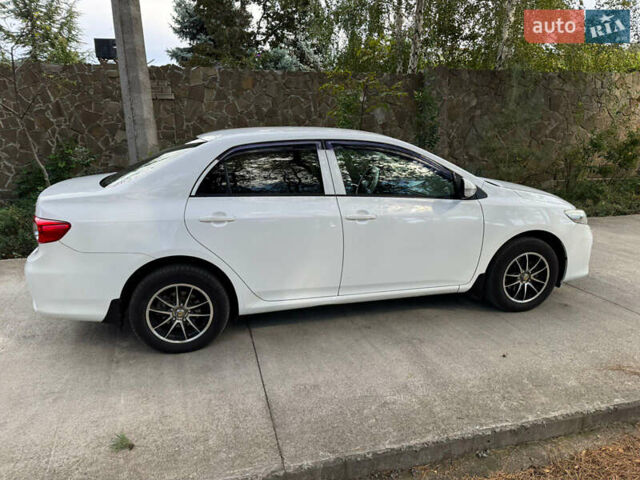 Белый Тойота Королла, объемом двигателя 1.33 л и пробегом 188 тыс. км за 6600 $, фото 2 на Automoto.ua