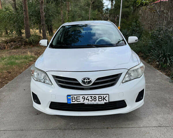 Белый Тойота Королла, объемом двигателя 1.33 л и пробегом 188 тыс. км за 6600 $, фото 1 на Automoto.ua