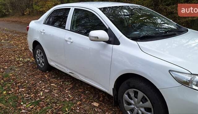 Белый Тойота Королла, объемом двигателя 1.3 л и пробегом 279 тыс. км за 6500 $, фото 10 на Automoto.ua