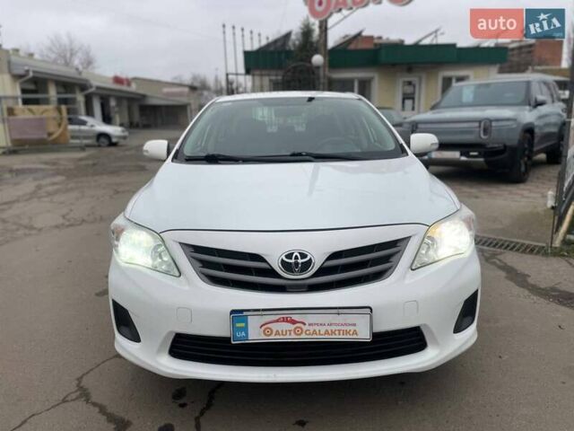 Белый Тойота Королла, объемом двигателя 1.33 л и пробегом 189 тыс. км за 7199 $, фото 1 на Automoto.ua