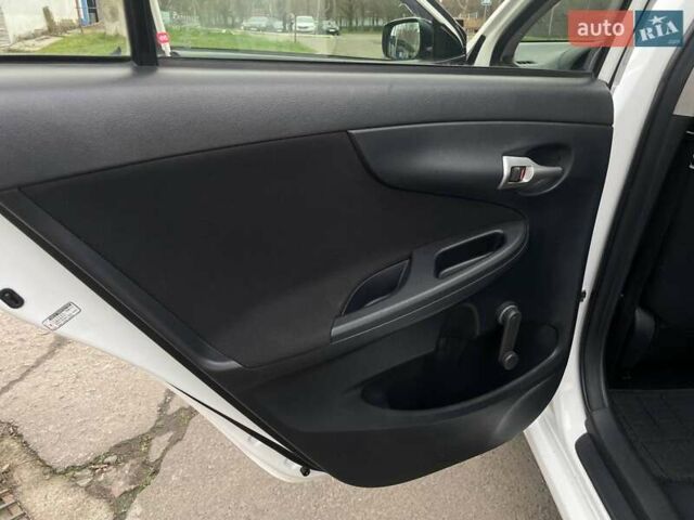 Белый Тойота Королла, объемом двигателя 1.33 л и пробегом 189 тыс. км за 7199 $, фото 18 на Automoto.ua