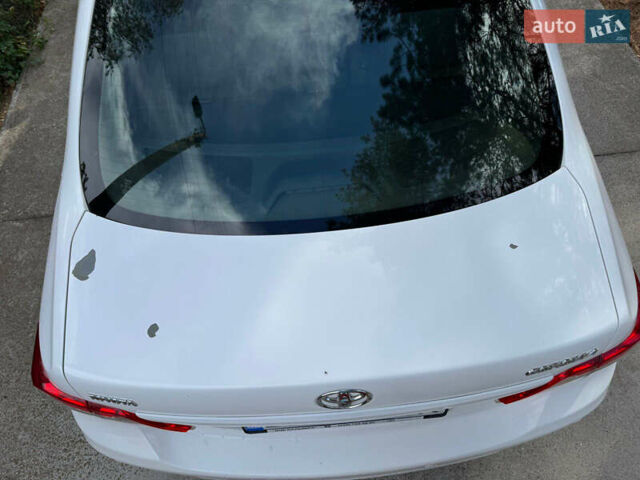 Белый Тойота Королла, объемом двигателя 1.33 л и пробегом 188 тыс. км за 6600 $, фото 4 на Automoto.ua