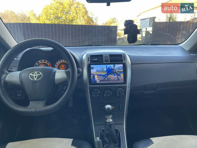 Белый Тойота Королла, объемом двигателя 1.33 л и пробегом 143 тыс. км за 7000 $, фото 2 на Automoto.ua