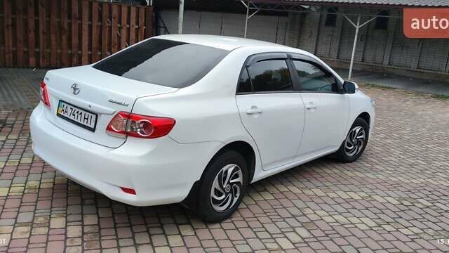 Белый Тойота Королла, объемом двигателя 1.33 л и пробегом 223 тыс. км за 6900 $, фото 3 на Automoto.ua