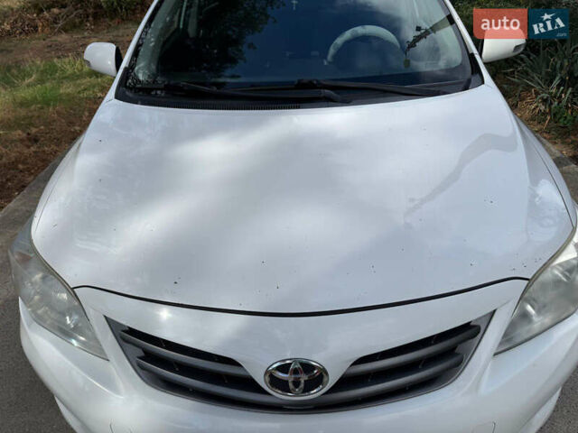 Белый Тойота Королла, объемом двигателя 1.33 л и пробегом 188 тыс. км за 6600 $, фото 13 на Automoto.ua