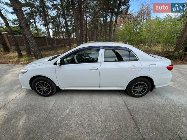 Белый Тойота Королла, объемом двигателя 1.33 л и пробегом 188 тыс. км за 6600 $, фото 5 на Automoto.ua