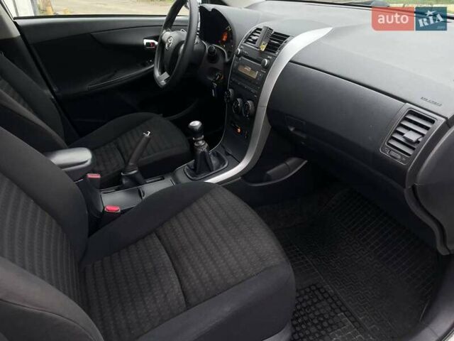 Белый Тойота Королла, объемом двигателя 1.33 л и пробегом 189 тыс. км за 7199 $, фото 21 на Automoto.ua