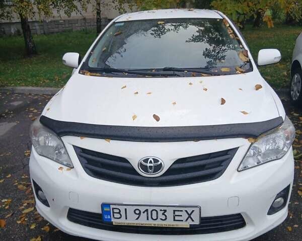 Белый Тойота Королла, объемом двигателя 1.33 л и пробегом 243 тыс. км за 7600 $, фото 5 на Automoto.ua