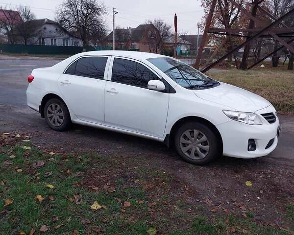 Білий Тойота Королла, об'ємом двигуна 1.33 л та пробігом 96 тис. км за 9800 $, фото 2 на Automoto.ua