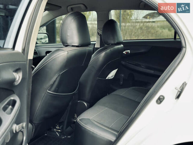 Білий Тойота Королла, об'ємом двигуна 1.33 л та пробігом 243 тис. км за 7399 $, фото 14 на Automoto.ua