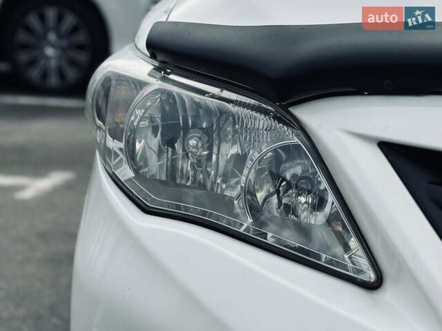 Білий Тойота Королла, об'ємом двигуна 1.33 л та пробігом 243 тис. км за 7399 $, фото 6 на Automoto.ua