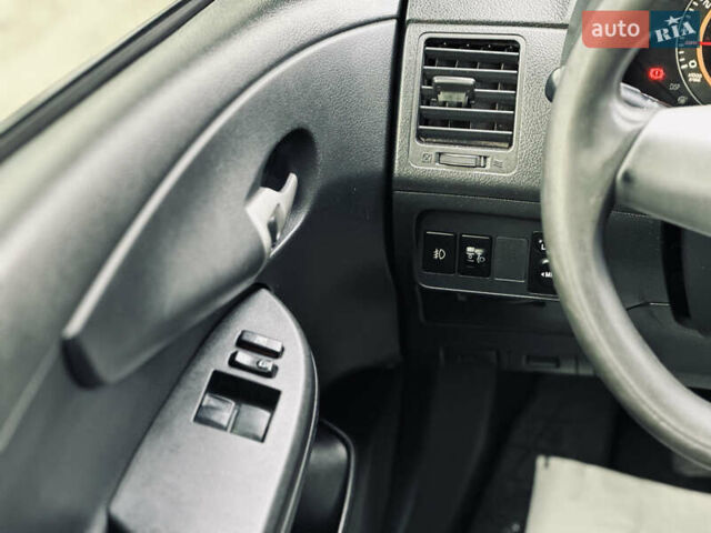 Білий Тойота Королла, об'ємом двигуна 1.33 л та пробігом 243 тис. км за 7399 $, фото 32 на Automoto.ua