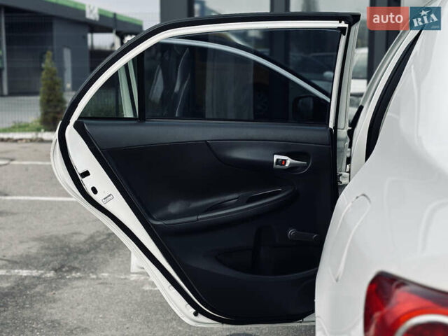 Білий Тойота Королла, об'ємом двигуна 1.33 л та пробігом 243 тис. км за 7399 $, фото 11 на Automoto.ua