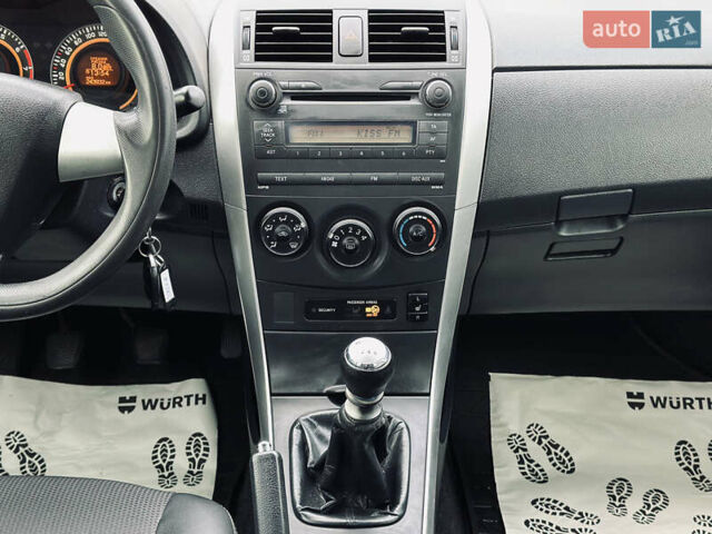 Білий Тойота Королла, об'ємом двигуна 1.33 л та пробігом 243 тис. км за 7399 $, фото 21 на Automoto.ua