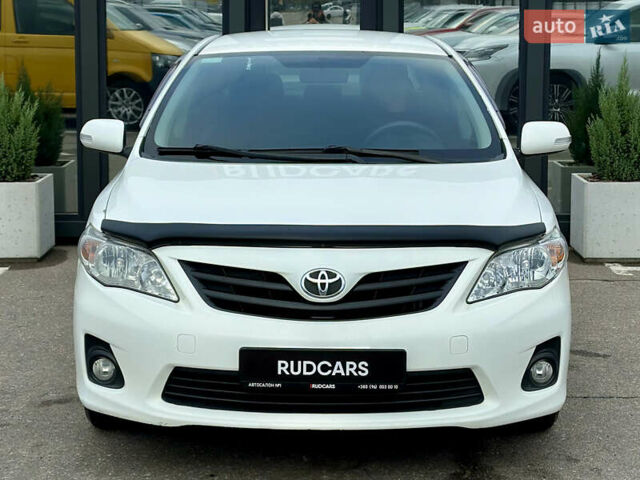 Білий Тойота Королла, об'ємом двигуна 1.33 л та пробігом 243 тис. км за 7399 $, фото 1 на Automoto.ua