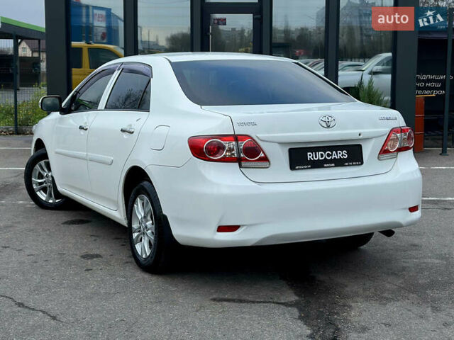 Білий Тойота Королла, об'ємом двигуна 1.33 л та пробігом 243 тис. км за 7399 $, фото 3 на Automoto.ua