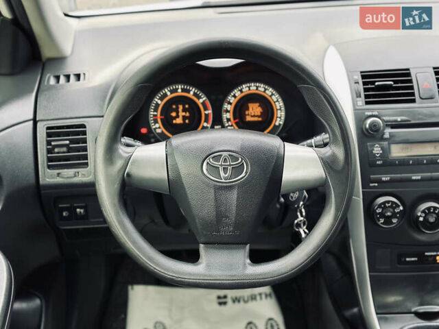 Білий Тойота Королла, об'ємом двигуна 1.33 л та пробігом 243 тис. км за 7399 $, фото 29 на Automoto.ua