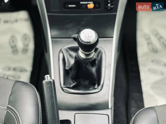 Білий Тойота Королла, об'ємом двигуна 1.33 л та пробігом 243 тис. км за 7399 $, фото 27 на Automoto.ua