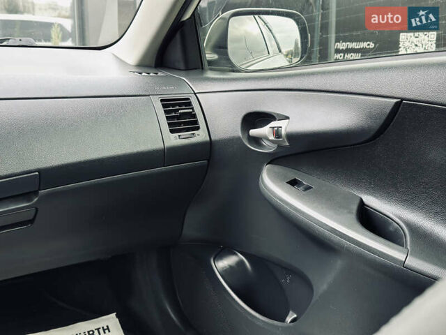 Білий Тойота Королла, об'ємом двигуна 1.33 л та пробігом 243 тис. км за 7399 $, фото 22 на Automoto.ua