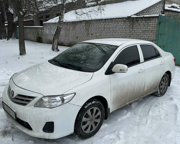 Білий Тойота Королла, об'ємом двигуна 1.33 л та пробігом 152 тис. км за 6400 $, фото 1 на Automoto.ua