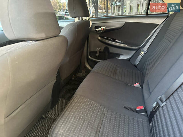 Белый Тойота Королла, объемом двигателя 1.3 л и пробегом 175 тыс. км за 7800 $, фото 13 на Automoto.ua