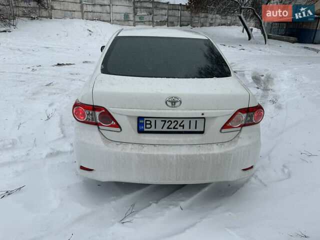 Білий Тойота Королла, об'ємом двигуна 1.33 л та пробігом 152 тис. км за 6400 $, фото 7 на Automoto.ua