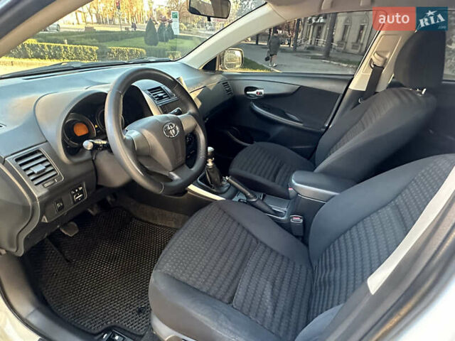 Белый Тойота Королла, объемом двигателя 1.3 л и пробегом 175 тыс. км за 7800 $, фото 7 на Automoto.ua