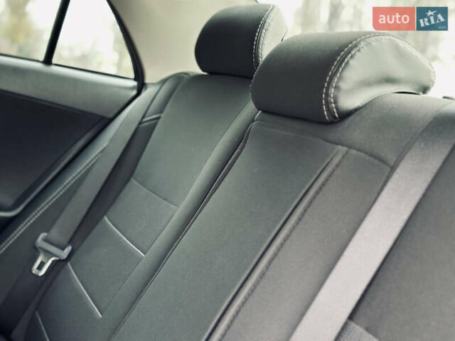 Білий Тойота Королла, об'ємом двигуна 1.33 л та пробігом 243 тис. км за 7399 $, фото 13 на Automoto.ua