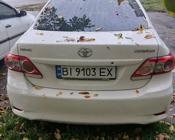 Белый Тойота Королла, объемом двигателя 1.33 л и пробегом 243 тыс. км за 7600 $, фото 2 на Automoto.ua