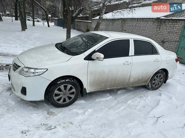 Білий Тойота Королла, об'ємом двигуна 1.33 л та пробігом 152 тис. км за 6400 $, фото 4 на Automoto.ua