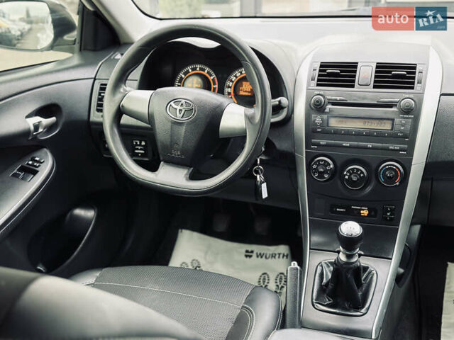 Білий Тойота Королла, об'ємом двигуна 1.33 л та пробігом 243 тис. км за 7399 $, фото 25 на Automoto.ua