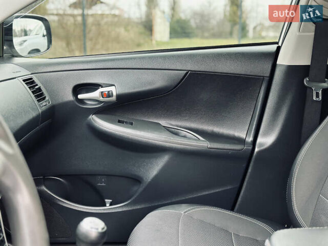 Білий Тойота Королла, об'ємом двигуна 1.33 л та пробігом 243 тис. км за 7399 $, фото 18 на Automoto.ua