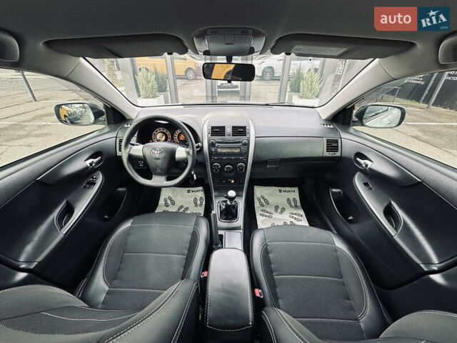 Білий Тойота Королла, об'ємом двигуна 1.33 л та пробігом 243 тис. км за 7399 $, фото 31 на Automoto.ua