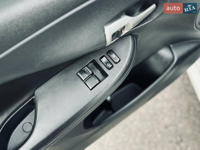 Білий Тойота Королла, об'ємом двигуна 1.33 л та пробігом 243 тис. км за 7399 $, фото 16 на Automoto.ua